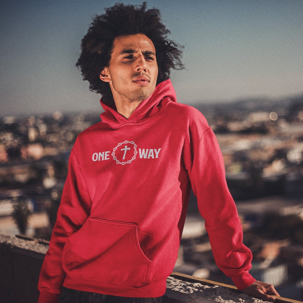 Person wearing a red 'ONE WAY' hoodie with a cityscape background and the organization's logo.